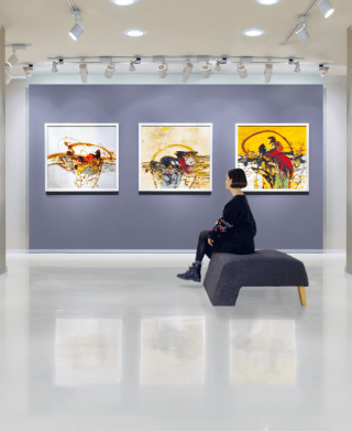 Woman enjoying art in an art gallery